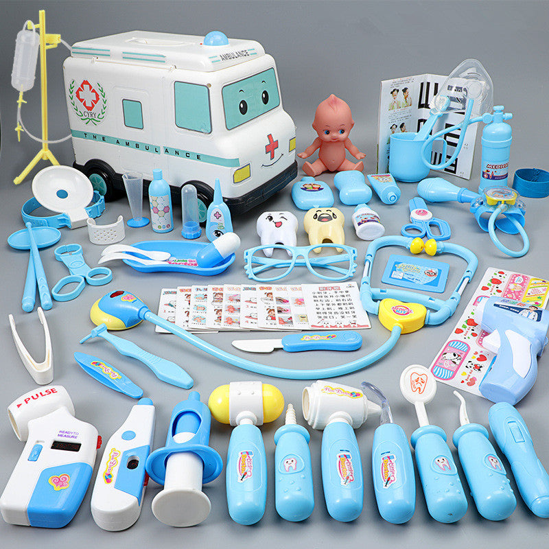 Baby dressed as doctor's medical box toy set