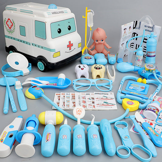 Baby dressed as doctor's medical box toy set